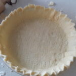 standard gluten-free pie crust, fluted in a pie pan