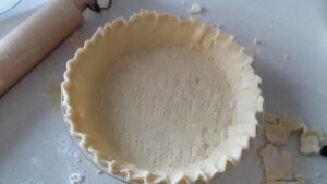 standard gluten-free pie crust, fluted in a pie pan