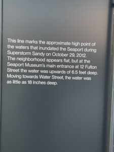 Sign on the side of the Seaport Museum in Manhattan