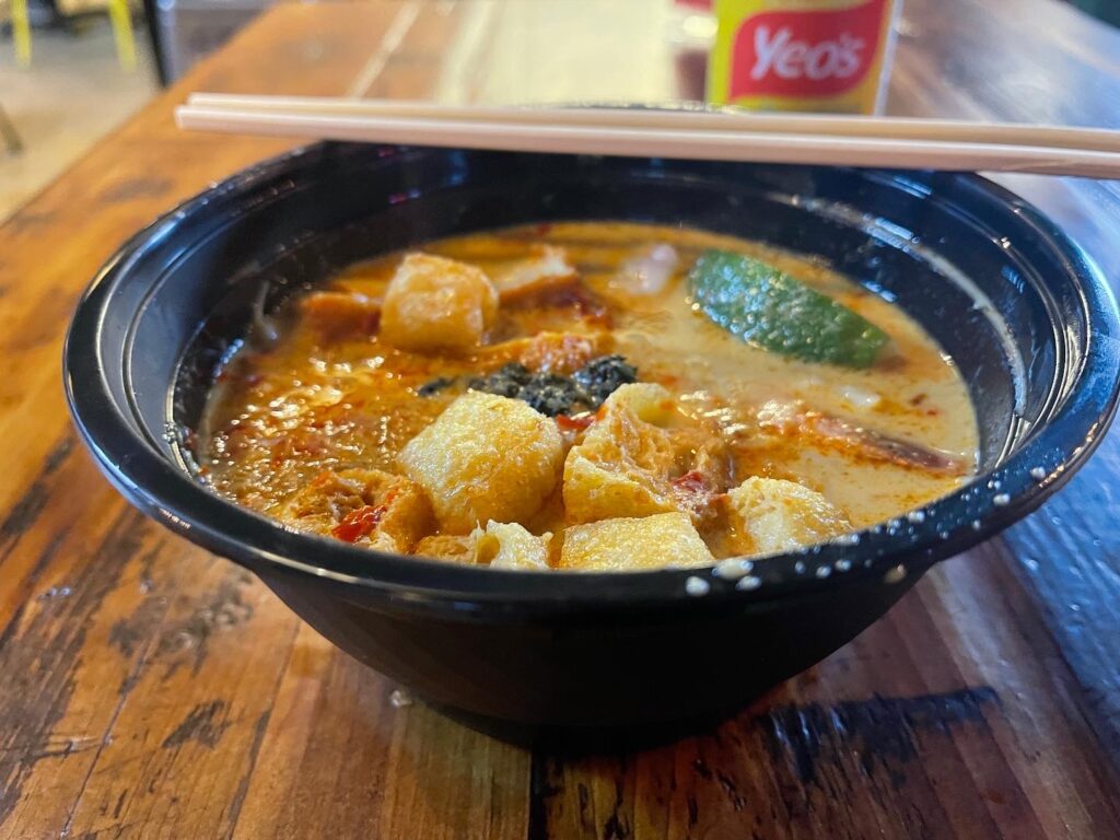 Bowl of nyonya laksa (curry noodles) at Daisy’s Dream