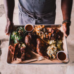 a plate of barbece at chef Darry Bell's Stateline Smokehouse pop-iup at Oxbow Market