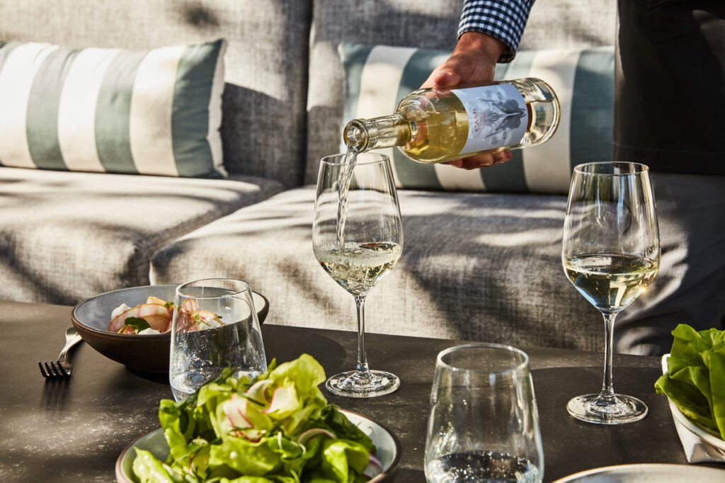 The vibe at SolBar at Solage includes comfy couches, perfect for lounging on while sipping wine and eating light bites at Calistoga Wine & Food