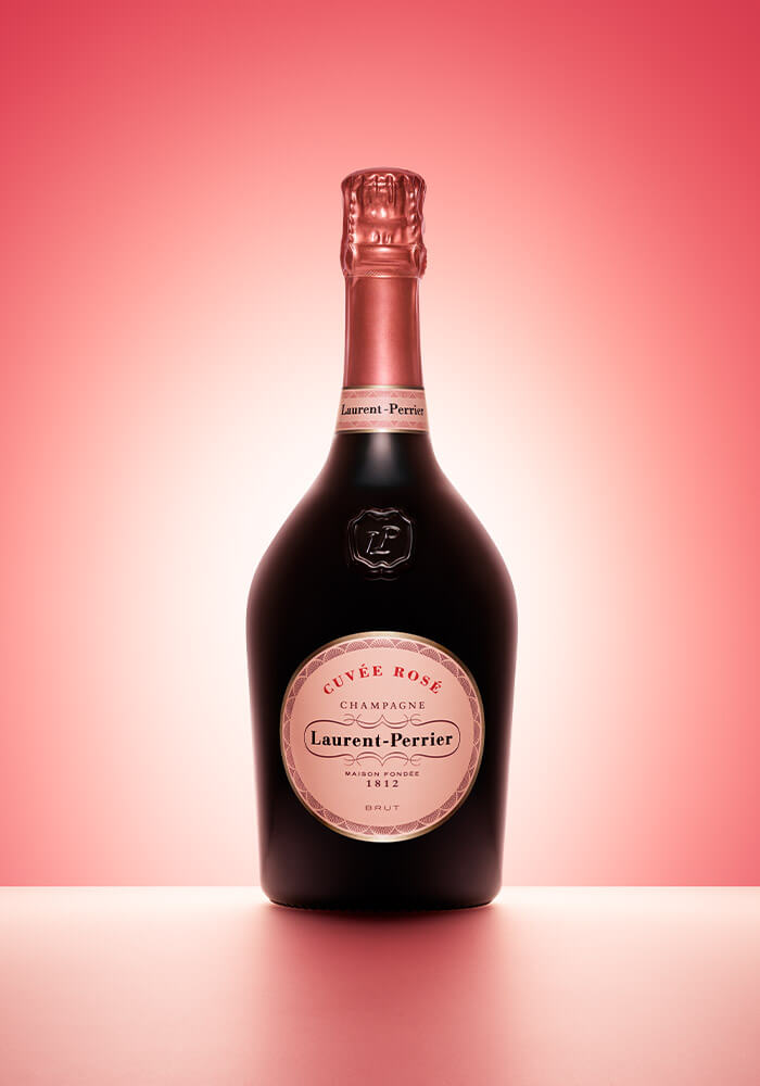 Laurent-Perrier Cuvée Rosé NV Champagne with a pink background