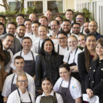 all the chefs at Press restaurant in St. Helena, Napa Valley, surround the editor of Salty magazine, Geeta Barsal
