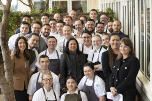 all the chefs at Press restaurant in St. Helena, Napa Valley, surround the editor of Salty magazine, Geeta Barsal