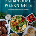 cookbook cover of Farmhouse Weeknights by Melissa Bahen shows lots of white dishes with fresh salads and fruit