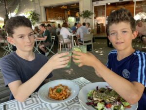 My boys at lunch at restaurant Suisse Pompeii 1890 after a morning touring Pompeii