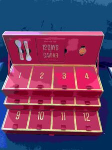 Caviar Co's 12 Days of Caviar comes in this beautiful red, three-tiered box