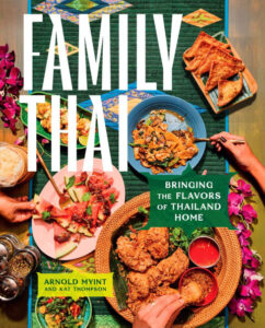 Family Thai cookbook cover by Arnold Myint shows a table laden with plates of food, a Thai feast!