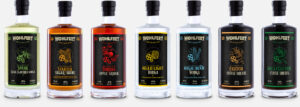 Wohlfert Craft Distilling decaf coffee liqueur and other products all in a row