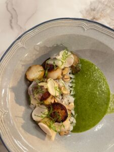 Hokkaido scallop nestled in rice with a swirl of green curry at Songbird parlour in Glen Ellen