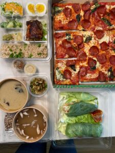 GOOP Kitchen takeout array including gluten-free pizza, soup and spring rolls