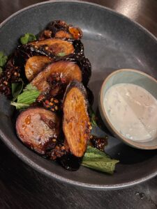 slices of seared Japanese eggplant and a bowl of labne
