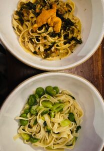 gluten-free pasta two ways - top with uni and bottom with fava beans and greens