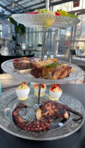 a tiered tea tray of treats at Rise Over Run rooftop restaurant, San Francisco