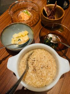 dairy-free hominy grits with fixin's at Prelude restaurant, San Francisco