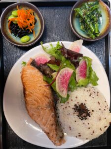 Cassava Japanese restaurant San Francisco's Bento Set meal with salmon, rice, and small dishes of hijiki seaweed and miso broccoli