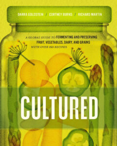 Cultured cookbook cover By Darra Goldstein, Cortney Burns, Richard Martin shows a jar drawing filled with veg and fennel fronds