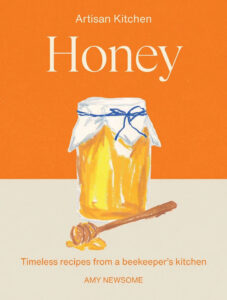 Honey by Amy Newsome cookbook cover is orange and tan with a drawing of a honey jar and spoon
