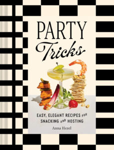 cover image of Party Tricks cookbook by Anna Hezel with black and white checkered frame around a water color drawing of party nibbles