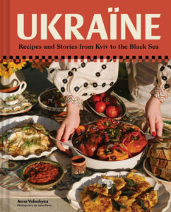 cover of Ukraïne cookbook by Anna Voloshyna shows a table laden with dishes
